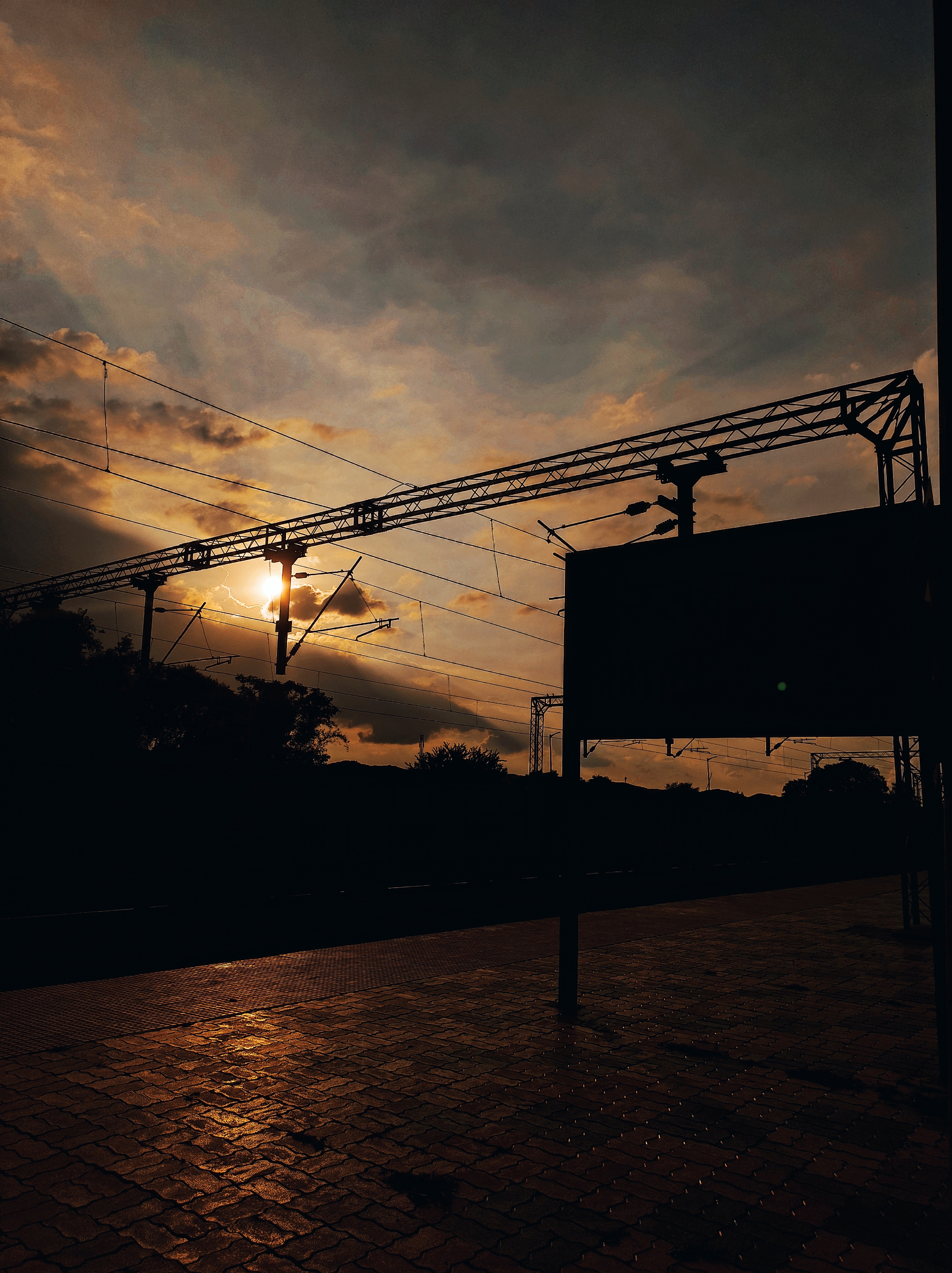 Moody urban sunset at station
